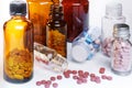 Group of bottles of medicine with pills. Royalty Free Stock Photo