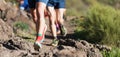 People trail running on a mountain path Royalty Free Stock Photo