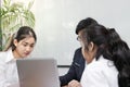 Group of young Asian business people working together in the office. Business teamwork cooperation partnership concept Royalty Free Stock Photo