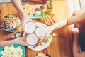 Group of young asian people celebrating beer festivals happy while enjoying home party Royalty Free Stock Photo