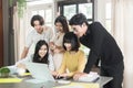 Group of young asian students high school working report together in the library Royalty Free Stock Photo