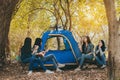 Group of Young Asian women camping and resting at forest Royalty Free Stock Photo