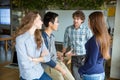 Group of young attractive peopleand discussing new project Royalty Free Stock Photo