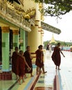 Group of young Buddhist novices in temple, Mandalay Hill, Myanmar