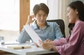 Group of young business asian discussing financial reports.board of directors planning project, considering business Royalty Free Stock Photo