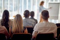 A group of young business people attends a business lecture in the conference room. Business, people, meeting, company