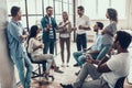 Group of Young Business People on Break in Office Royalty Free Stock Photo