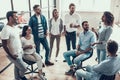 Group of Young Business People on Break in Office Royalty Free Stock Photo