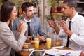 Group of young Business people enjoy in lunch at restaurant Royalty Free Stock Photo