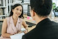 Group of young business people in smart casual working and brainstorm planning new project on desk in meeting room at modern offic Royalty Free Stock Photo