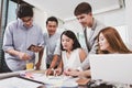 Group of Young Business People Working on an office Desk Royalty Free Stock Photo