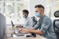 Group of young business people working in office wearing medical protective mask Royalty Free Stock Photo