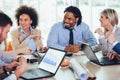 Young business people working together in creative office. Selective focus Royalty Free Stock Photo