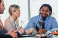 Young business people working together in creative office. Selective focus Royalty Free Stock Photo