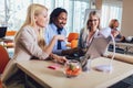Young business people working together in creative office. Selective focus Royalty Free Stock Photo
