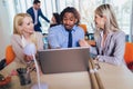 Young business people working together in creative office. Selective focus Royalty Free Stock Photo