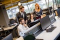 Group of young business people are working together with desktop computer Royalty Free Stock Photo