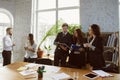 Group of young business professionals having a meeting, creative office Royalty Free Stock Photo