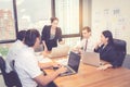 Group of young business team with woman manager standing leader meeting in conference room Royalty Free Stock Photo