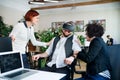 Group of young businesspeople with VR goggles in office, start-up concept. Royalty Free Stock Photo