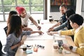 Group of young businesspersons having discussion