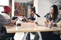 Group of young businesspersons having discussion