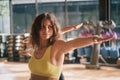 Group Young of caucasian woman in sportswear practicing yoga pose warrior in the gym, Concept of relaxation and meditation