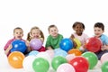 Group Of Young Children In Studio With Balloons Royalty Free Stock Photo