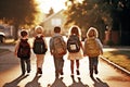 Group of young children walking together in friendship, back-to-school concept . Royalty Free Stock Photo