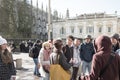 Group of young Chinese tourists seen in a group outside the famous Kings College.