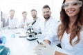 Group of young clinicians experimentation in research laboratory Royalty Free Stock Photo