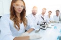 Group of young clinicians experimentation in research laboratory Royalty Free Stock Photo