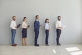 Group of young confident business people are waiting for an interview for a new job. Royalty Free Stock Photo