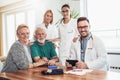 Young doctor during home visit senior people Royalty Free Stock Photo