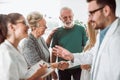 Young doctor during home visit senior people Royalty Free Stock Photo