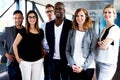 Group of young executives posing for picture