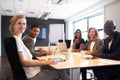 Group of young executives smiling at camera