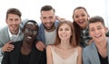 Group of young executives smiling at camera during a work meeting. Royalty Free Stock Photo