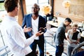 Group of young executives working on staircase Royalty Free Stock Photo