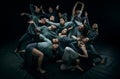 Group of young expressive talented people dancing contemp against black studio background. Concept of contemporary dance