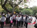 Shenzhen, China: young women employees are doing activities outdoors
