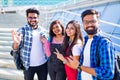 Group of young female and male college students on campus Royalty Free Stock Photo