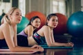 Group of young females practicing yoga in gym Royalty Free Stock Photo