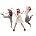 Group of young femanle hip hop dancers on white background Royalty Free Stock Photo