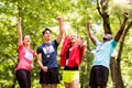 Group of young fit friends happy after finishing race. Royalty Free Stock Photo