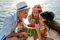 Group of friends at beach drinking cocktails having fun on summer vacation. People travel concept Royalty Free Stock Photo