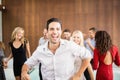 Group of young friends dancing Royalty Free Stock Photo