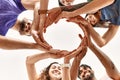 Group of young friends doing circle symbol with hands together Royalty Free Stock Photo