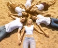 Group young friends enjoying a beach party on vacation. People h Royalty Free Stock Photo