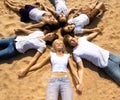 Group young friends enjoying a beach party on vacation. People h Royalty Free Stock Photo